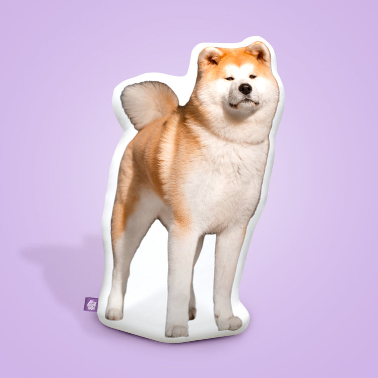 Custom shaped pillow depicting an Akita Inu dog in a standing pose against a purple background - Size: 16"