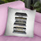 High Fashion Book Stack Black & White, Gold Font Throw Pillow By Amanda Greenwood
